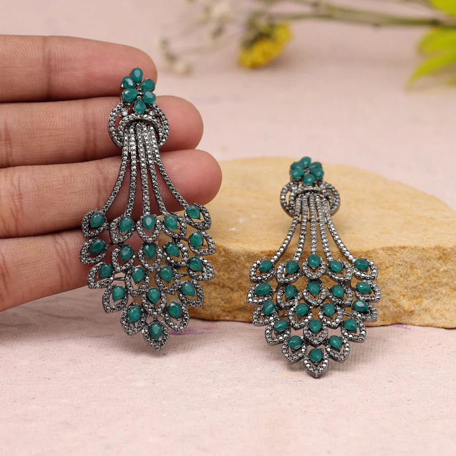 Green oxidized peacock feather earrings