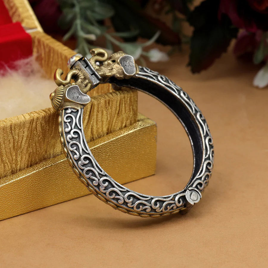 oxidized gold-silver tone bracelet with elephant accents