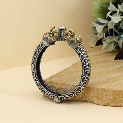 oxidized gold-silver tone bracelet with elephant accents