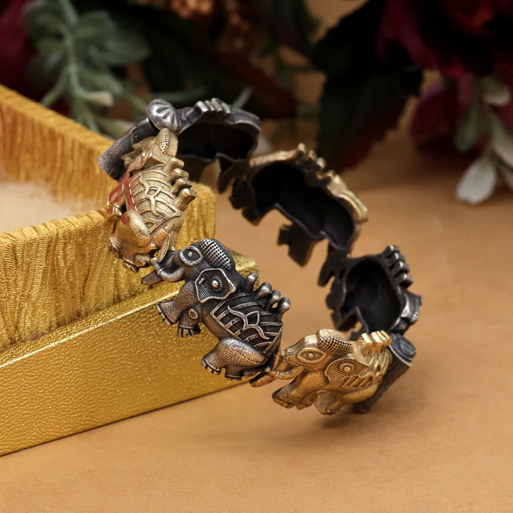 oxidized gold-silver tone bracelet with elephant accents