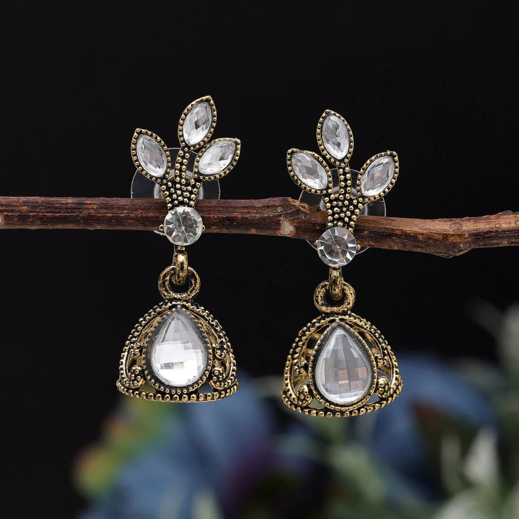 Gold tone oxidized earrings (jhumki) with glass stones