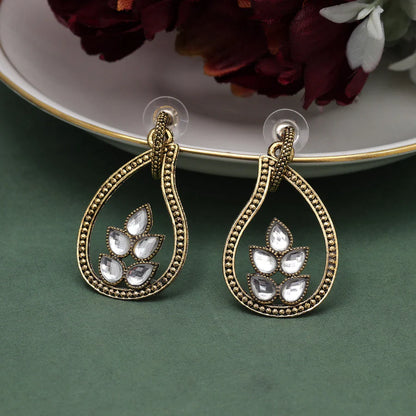 gold tone oxidized earrings with glass stones