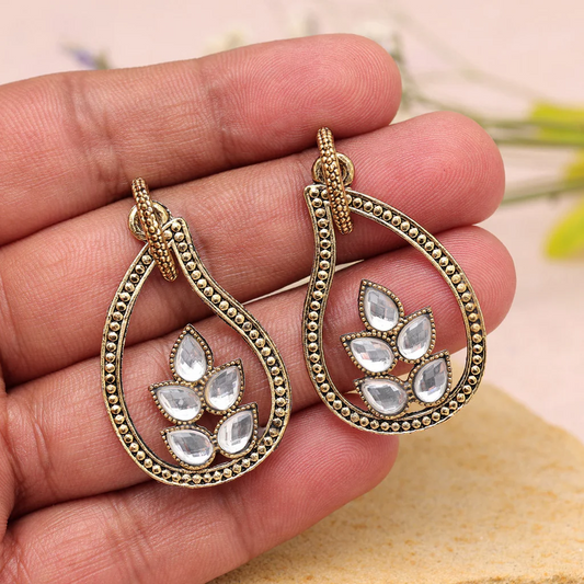 gold tone oxidized earrings with glass stones