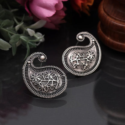 ambiya shaped oxidized earrings in silver tone